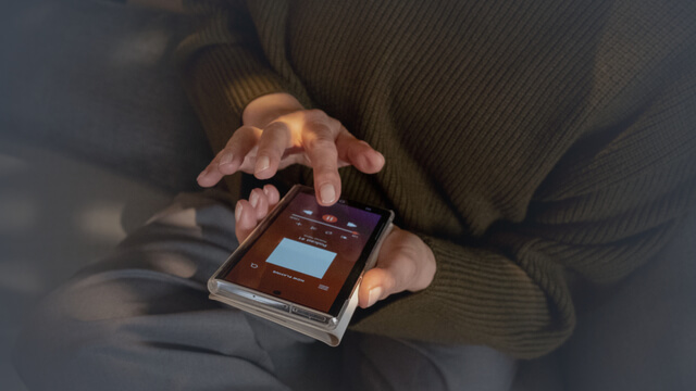 Person using podcast app on a smartphone